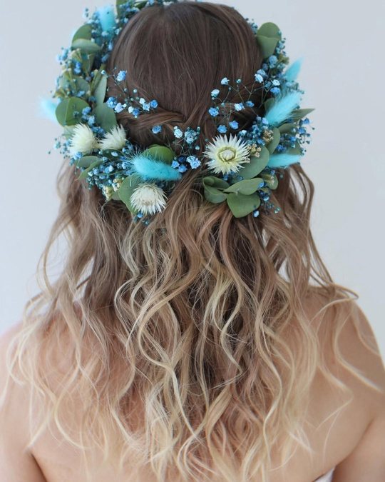 Fresh-flower crown and beachy waves for a wedding