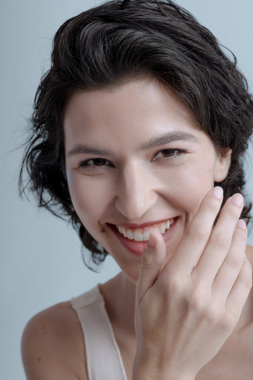 Nude makeup with a dewy skin finish — suited to bridal and editorial