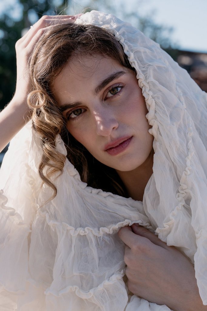 Delicate look in white tulle — a bridal makeup reference