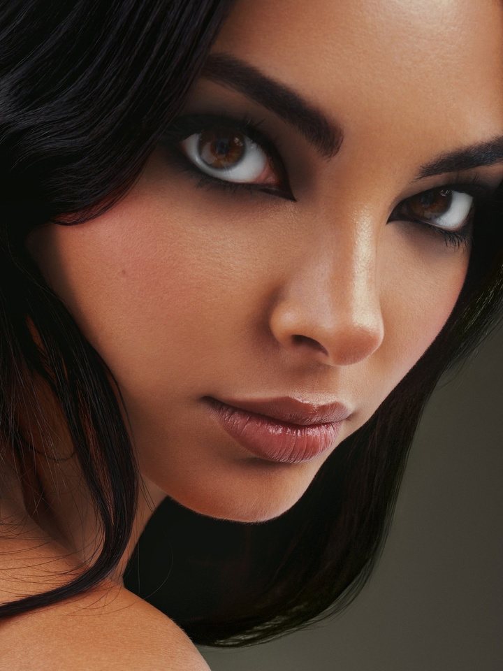 Warm-toned smoky eye and sculpted complexion